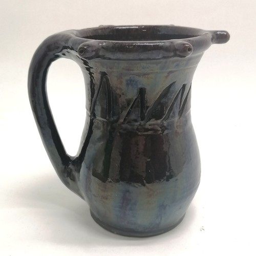 203 - Antique puzzle jug with cut-out design Anno.1714 with treacle glaze - 20cm high ~ 1 spout has been r... 