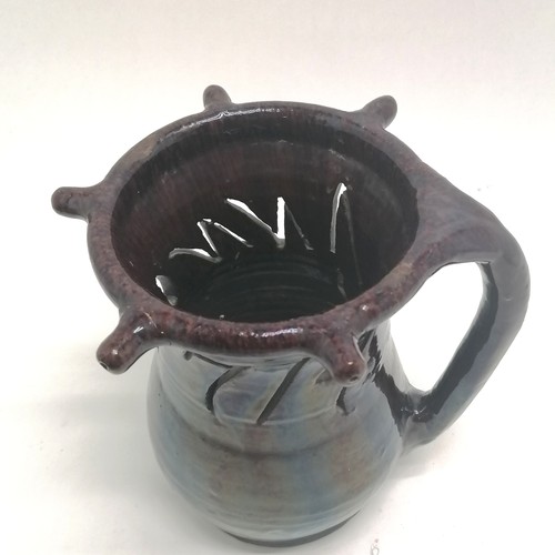 203 - Antique puzzle jug with cut-out design Anno.1714 with treacle glaze - 20cm high ~ 1 spout has been r... 