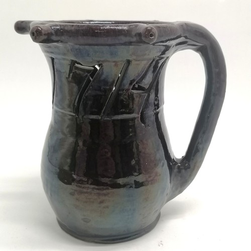 203 - Antique puzzle jug with cut-out design Anno.1714 with treacle glaze - 20cm high ~ 1 spout has been r... 