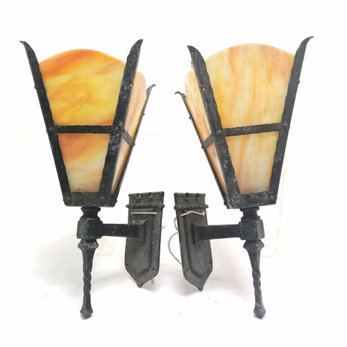 219 - Pair of metal framed wall lights with mottled coloured glass panels - 34cm long