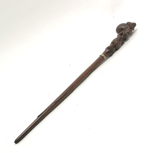 224 - Antique hand carved walking stick / parasol handle in the form of a promenading lady - total length ... 