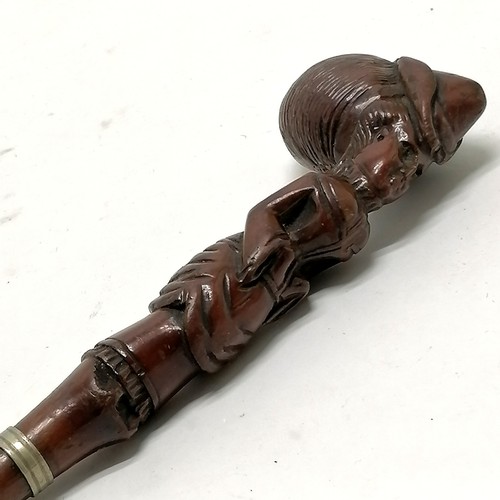 224 - Antique hand carved walking stick / parasol handle in the form of a promenading lady - total length ... 