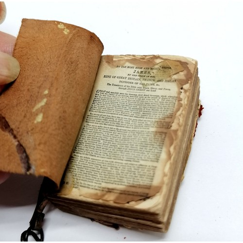 229 - Miniature bible (4cm high & a/f) printed by David Bryce with original magnifier