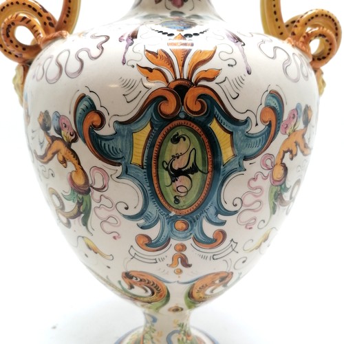 236 - Pair of large Italian Majolica vases with serpent scroll detail handles and profusely hand decorated... 