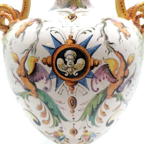 236 - Pair of large Italian Majolica vases with serpent scroll detail handles and profusely hand decorated... 