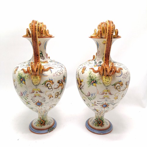236 - Pair of large Italian Majolica vases with serpent scroll detail handles and profusely hand decorated... 