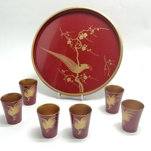 15 - Oriental red lacquer circular tray (27.5cm) with set of 6 matching beakers depicting asian bird deta... 