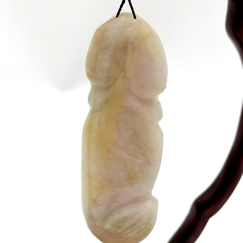 25 - Hardstone carved jade phallus suspended on a stand - 19cm high t/w antique jade cup (a/f) etc