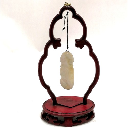 25 - Hardstone carved jade phallus suspended on a stand - 19cm high t/w antique jade cup (a/f) etc