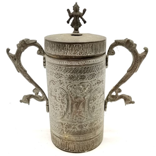 42 - Vintage Indian brass 2 handled cylindrical vessel with lid adorned with deity finial and has animali... 