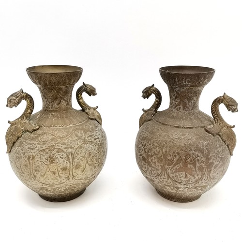 46 - Indian pair of brass 2 handled vases - 21cm high with engraved detail of dancers to the bodies