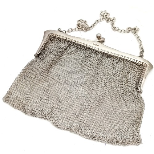 849 - 1924 silver mesh purse by AM&M Ld (13cm x 13cm and slight a/f) t/w silver napkin ring & silver blade... 