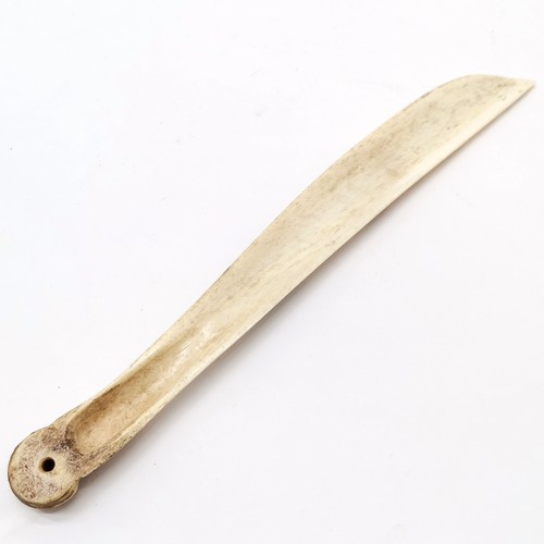 80 - Inuit scrimshaw carved bone scraping knife with carabou & tent detail - 24cm long