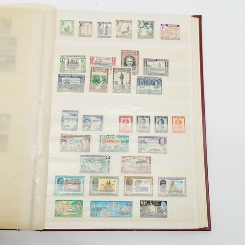 94 - Commonwealth mostly M/M (MH) useful stamp collection in red stockbook inc KGVI & early QEII sets inc... 