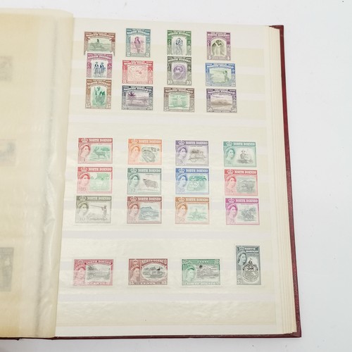 94 - Commonwealth mostly M/M (MH) useful stamp collection in red stockbook inc KGVI & early QEII sets inc... 