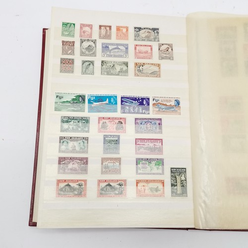 94 - Commonwealth mostly M/M (MH) useful stamp collection in red stockbook inc KGVI & early QEII sets inc... 