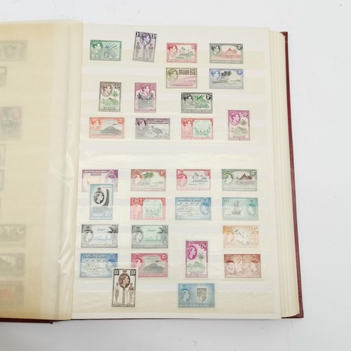 94 - Commonwealth mostly M/M (MH) useful stamp collection in red stockbook inc KGVI & early QEII sets inc... 