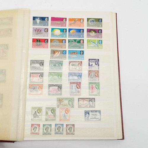 94 - Commonwealth mostly M/M (MH) useful stamp collection in red stockbook inc KGVI & early QEII sets inc... 