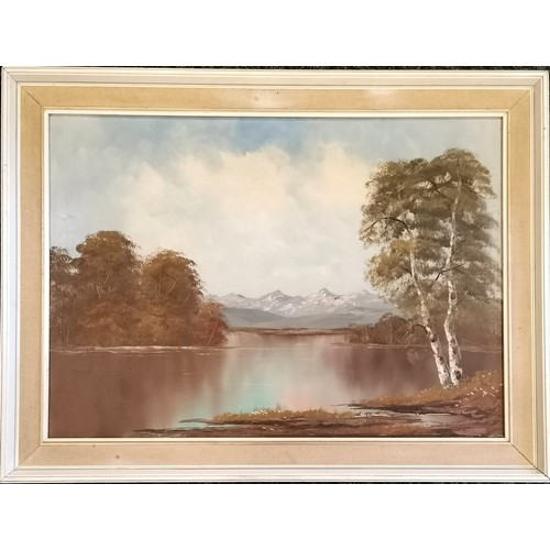 127 - Oil painting on canvas of a lake / trees / mountains with label on reverse identifying artist as Blo... 