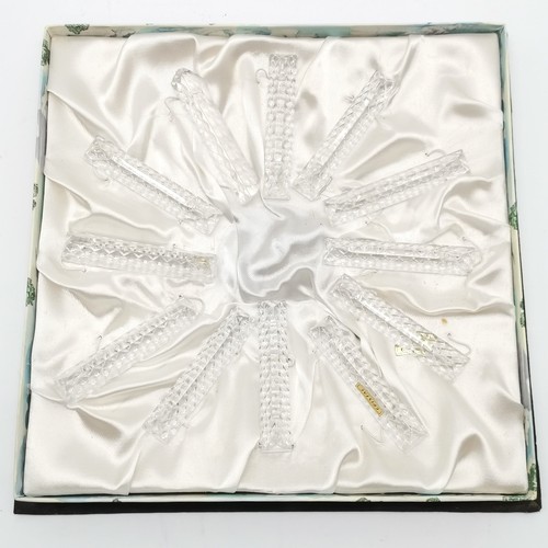 133 - Boxed set of 12 x crystal glass knife rests - box 29cm square ~ slight nibbles to some of the rests