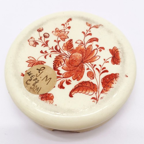 155 - Antique Leeds creamware lidded pot with iron red decoration of a seated couple having tea with a dog... 