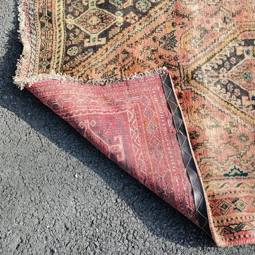 175 - Pink wool grounded rug ~ 172cm x 118cm - no obvious signs of damage, slight creasings