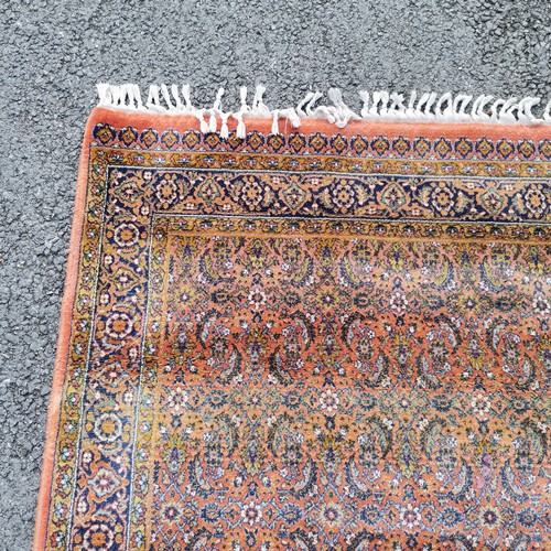 176 - Terracotta wool Turkish grounded rug by Turkoman London ~ 171cm x 114cm - no obvious signs of damage