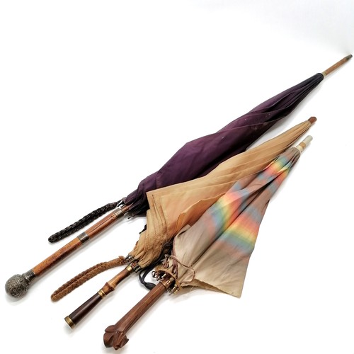 221 - 3 vintage umberellas longest 93cm has 1929 silver mounts, includes a hand carved dogs head handled u... 