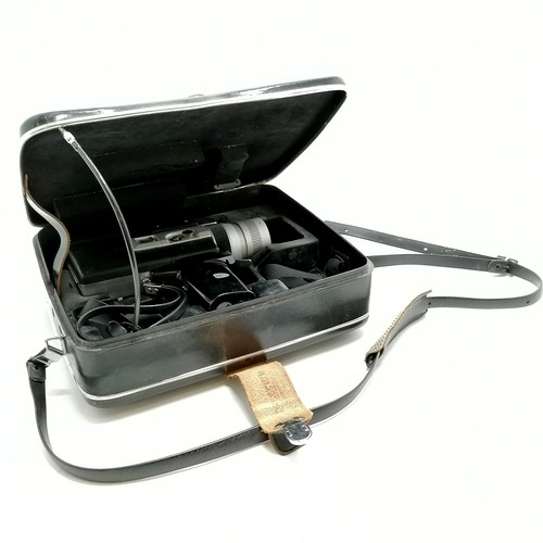 223 - Canon Auto Zoom 518 Super 8 cine camera in original black leather case - has some wear to the case