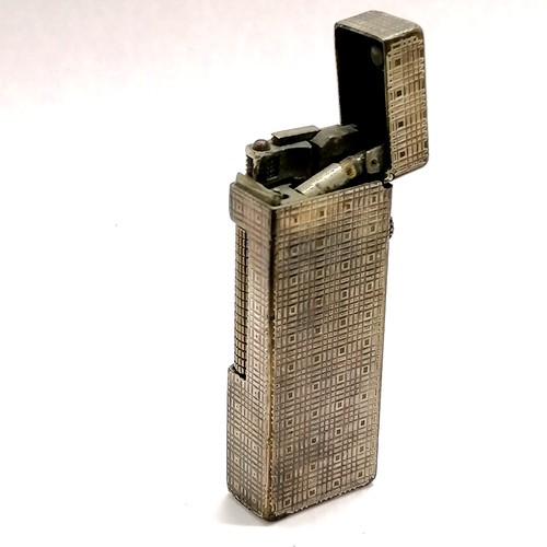 231 - Dunhill silver plated lighter with engine turned detail - 6.5cm long & has obvious signs of use