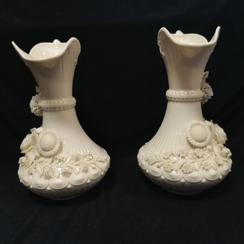 367 - Belleek antique pair of ewers with encrusted decoration - 24cm high ~ slight losses to encrusted det... 