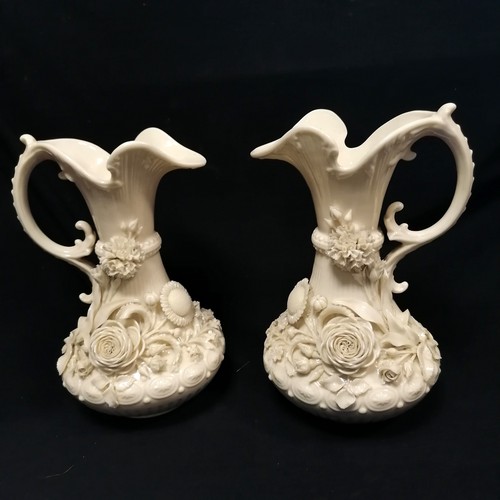 367 - Belleek antique pair of ewers with encrusted decoration - 24cm high ~ slight losses to encrusted det... 