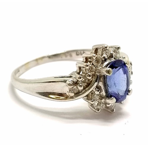 403 - 18ct hallmarked white gold sapphire & diamond (0.23cts total weight indicated) cluster ring - size M... 