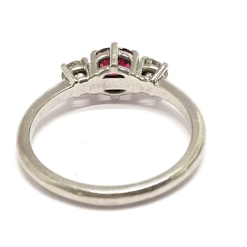 418 - Unmarked platinum ruby / diamond ring - size M & 3.8g total weight