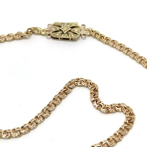 441 - 9ct fancy link 60cm chain with an antique 9ct marked gold clasp - total weight 15.5g ~ clasp has fra... 