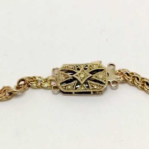 441 - 9ct fancy link 60cm chain with an antique 9ct marked gold clasp - total weight 15.5g ~ clasp has fra... 