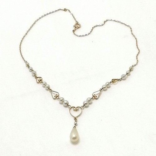 449 - 9ct marked gold necklace with faux pearl detail - 40cm long & total weight 4.8g ~ the pearl drop has... 