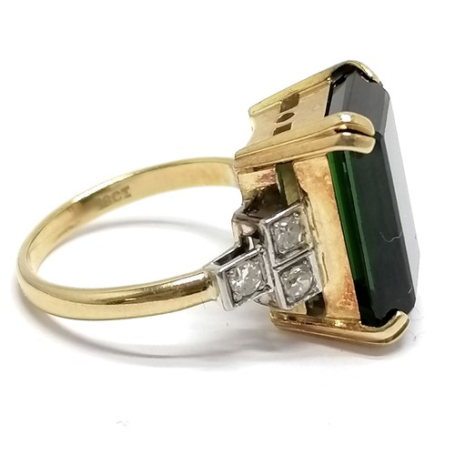 500 - 18ct marked gold large green tourmaline (approx 16mm long) & diamond ring - size N & 7.4g total weig... 