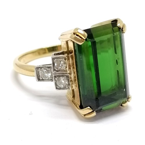 500 - 18ct marked gold large green tourmaline (approx 16mm long) & diamond ring - size N & 7.4g total weig... 