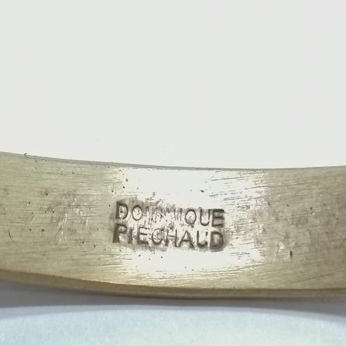 520 - Dominique Piéchaud (1922-2011) bronze bangle with red enamel detail - 7cm across & slight distortion