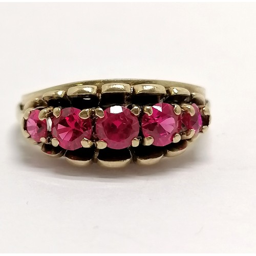 591 - 9ct marked gold red stone ring - size N½ & 4.8g total weight - SOLD ON BEHALF OF THE NEW BREAST CANC... 