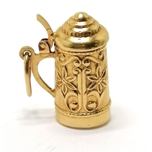 614 - Unmarked gold (touch tests as 14ct or higher) stein charm 2.5cm high 4.9g