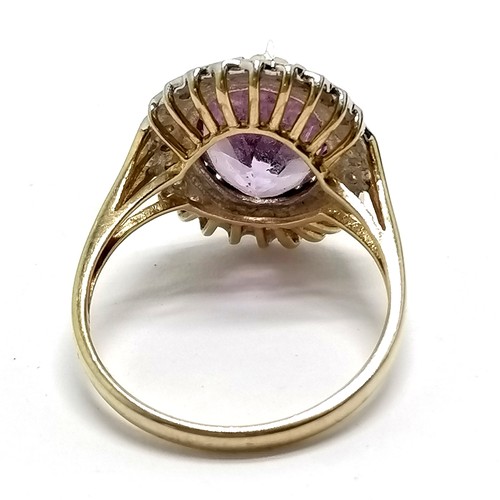 621 - 9ct hallmarked gold amethyst & diamond cluster ring - size U & 4.8g total weight