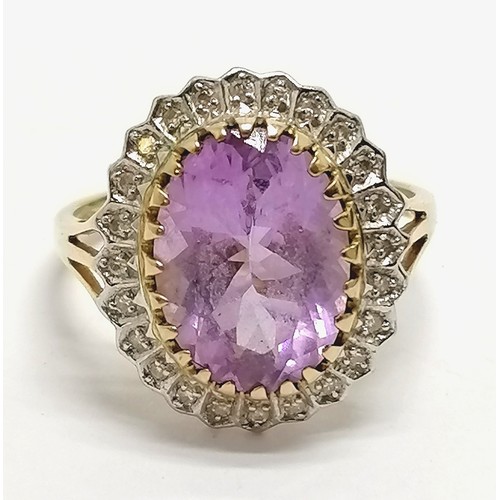 621 - 9ct hallmarked gold amethyst & diamond cluster ring - size U & 4.8g total weight