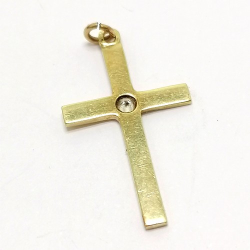 626 - French marked gold cross set with a diamond - 2.5cm high & 0.9g total weight