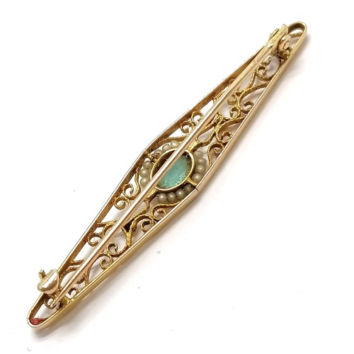 627 - 10ct marked gold filigree brooch set with blue stone + seed pearls - 5.2cm & 2.5g total weight