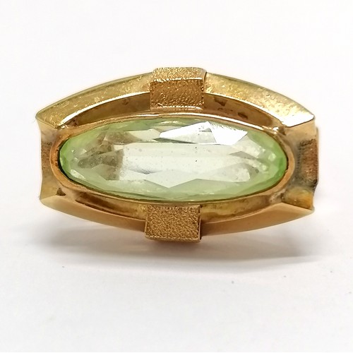 631 - Foreign marked gold (touch tests as 18ct) ring set with green stone - size N½ & 4.7g total weight