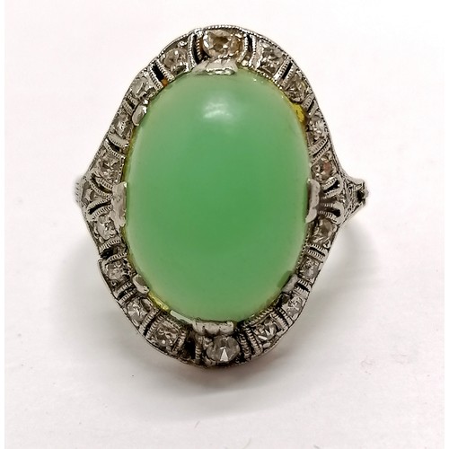 721 - Unmarked white gold Art Deco diamond / cabochon jade stone set ring with unusual hinged (with catch)... 