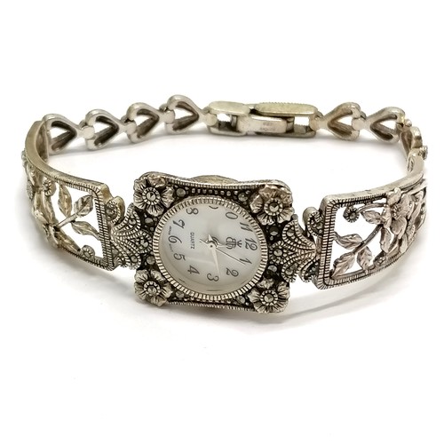 740 - Sterling silver quartz ladies wristwatch with marcasite stone set detail - 18cm long & 25g in a Broo... 