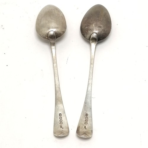 775 - Pair of silver London 1803 tablespoons Maker WE- 22.5cm long and 127g - slight dents to one bowl.